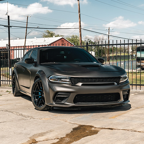 Ceramic Coating for Cars - Front/Side view of freshly ceramic coated grey sports car Charger