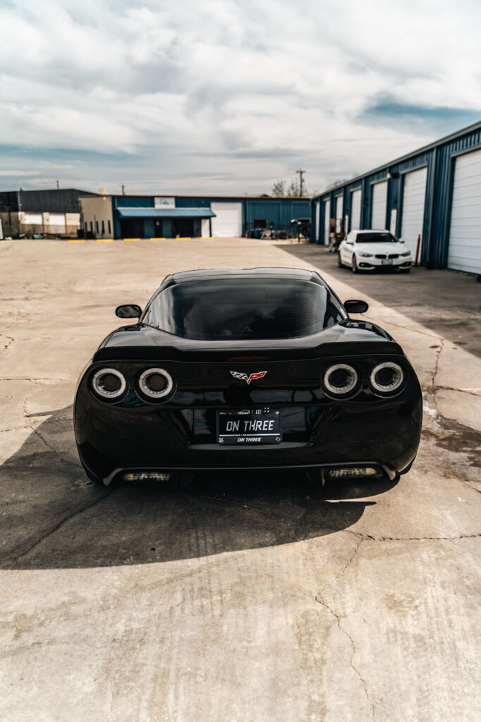 Detailing Near Me - Rear view of a freshly detailed and waxed Corvette