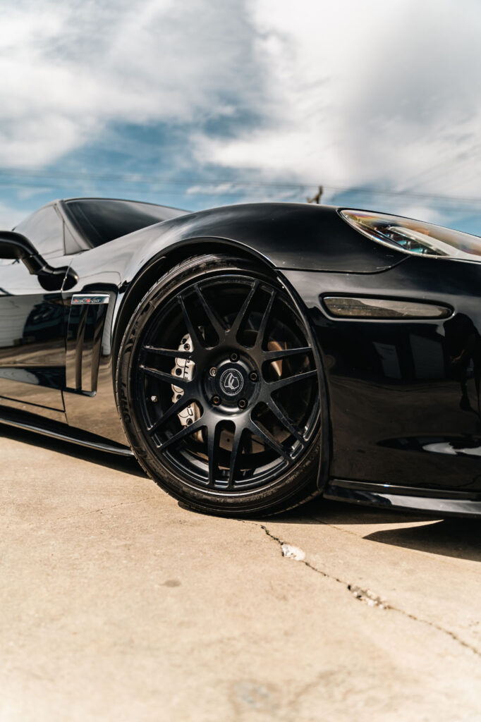 Auto Detailing Near Me - Low side view of a freshly detailed and waxed Corvette